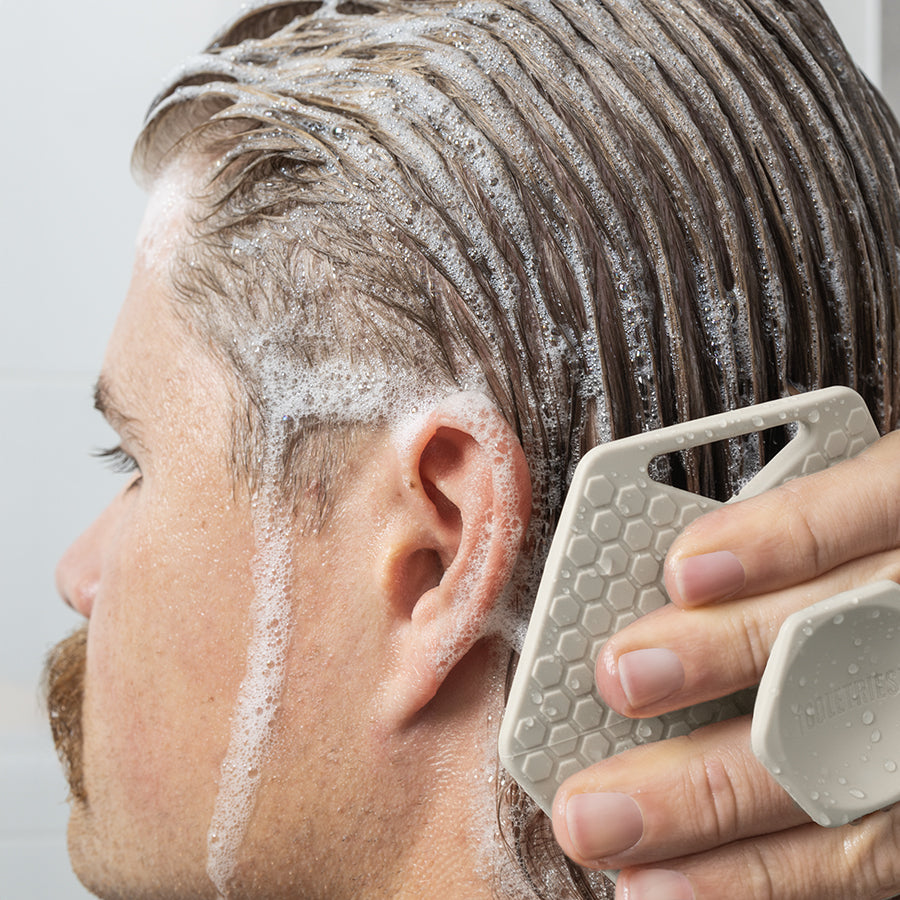 The Scalp Scrubber Sand